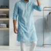 Man wearing sky blue embroidered kurta with white pants and tan sandals (2)