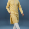 Men's bright yellow festive kurta featuring intricate mirror embroidery and mandarin collar, perfect for Haldi ceremony (1)