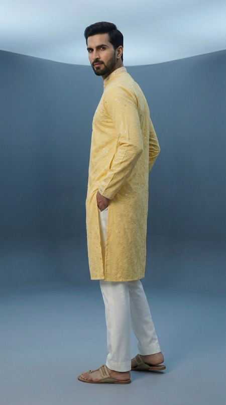 Men's bright yellow festive kurta featuring intricate mirror embroidery and mandarin collar, perfect for Haldi ceremony (1)