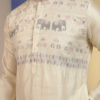Off-white silk men's kurta with detailed elephant embroidery, straight-cut pajama, and sandals (1)